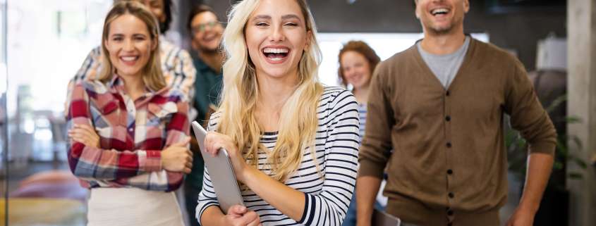 Successful company with happy employees in modern office